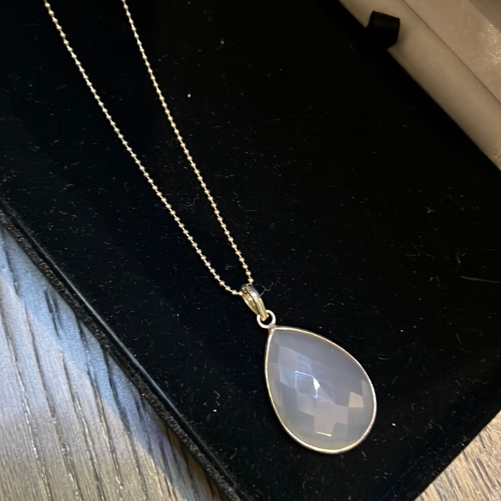 Long necklace with grey pendant